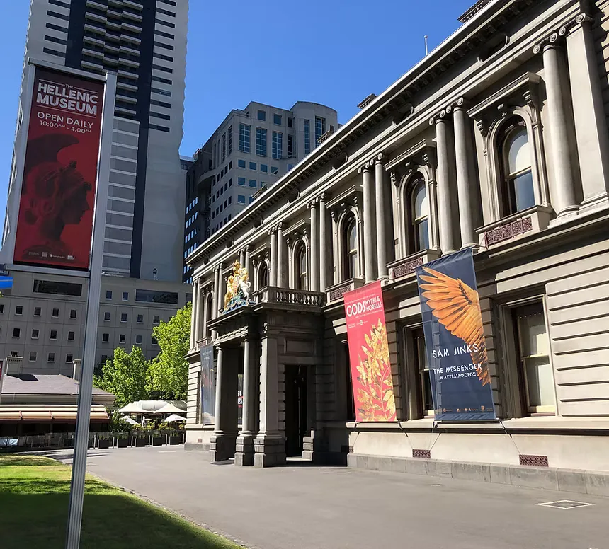 Historic neoclassical facade of the former Royal Mint building housing the Hellenic Museum in Melbourne CBD.