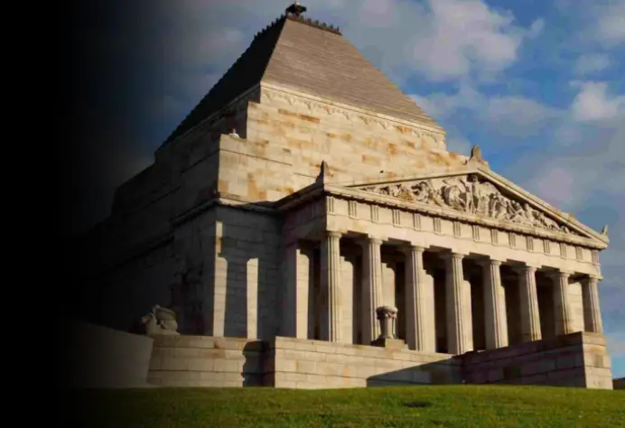 Grand classical stone facade and columns of the Shrine of Remembrance civic landmark in Melbourne.
